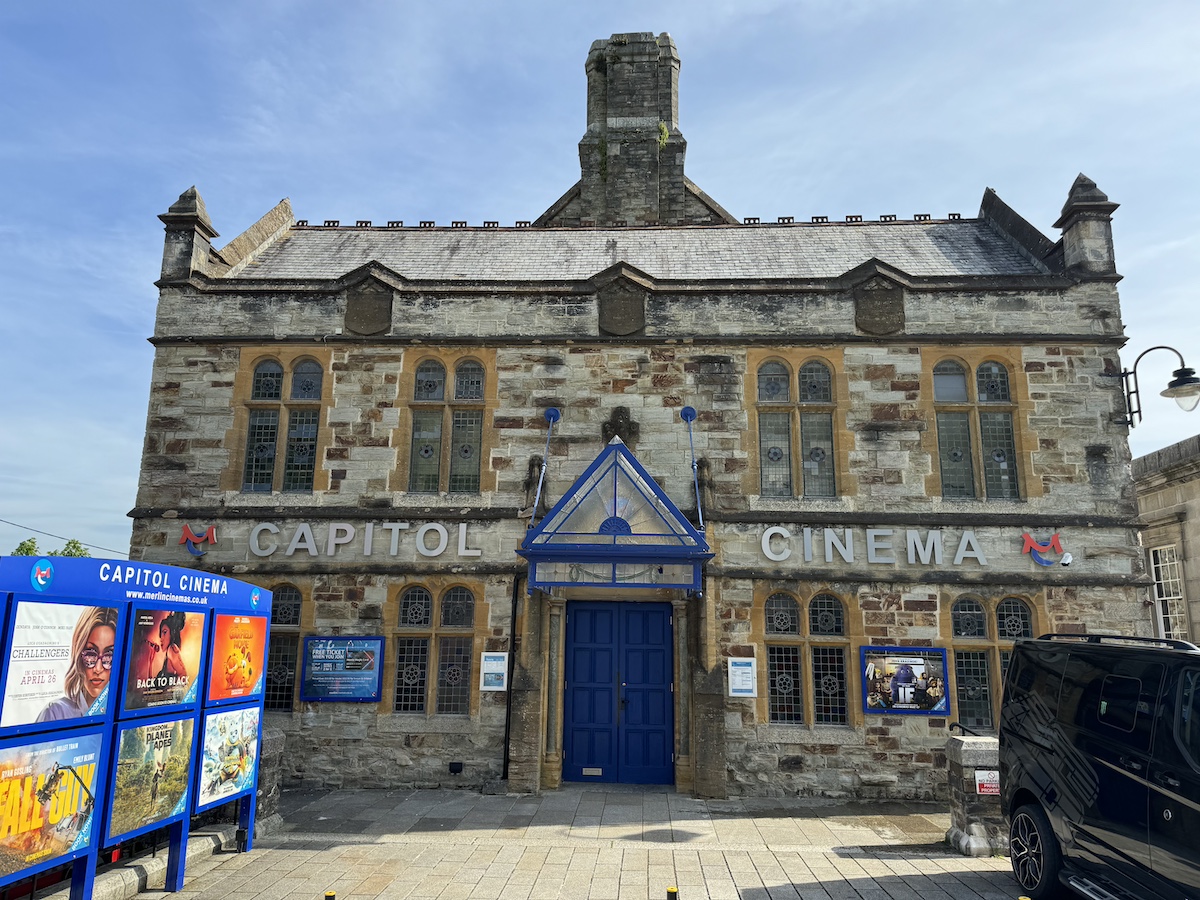 Stone building with Capitol Cinema sign